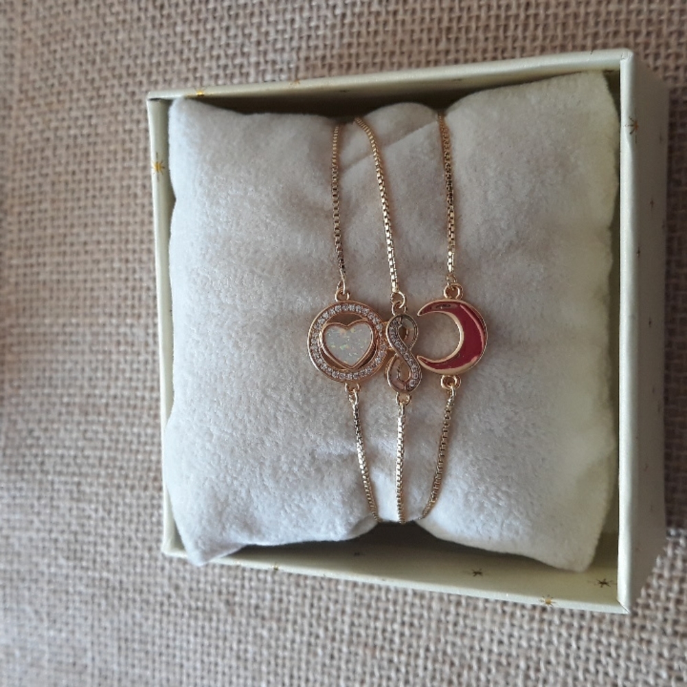 NWT designer bracelets trio.